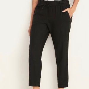 Black cotton loose pants with tie around waist.